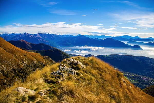 The Monte Lema - Monte Tamaro hike is perfect in Autumn when it is not very hot during daytime, cool refreshing winds let you feel the nature. Early in the morning there's usually clouds below in valleys and clear skies above in the mountains.