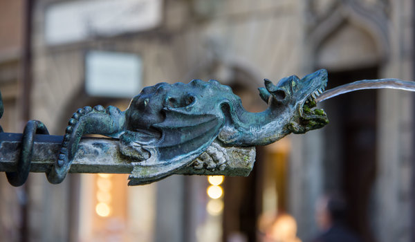 A dragon as a street drinking fountain in Lucerne