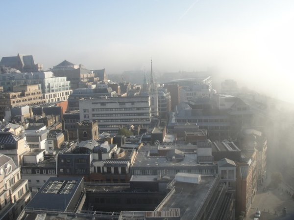 It is actually a 2010 photo, on a misty morning with the fog creeping over from the river, the Tower Bridge is still there under this white blanket in the right-hand upper corner.