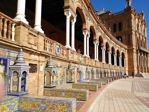 Mosiac and architecture inspires as far as the eye can see at the 'Plaza de Espana.' Seville, Spain.