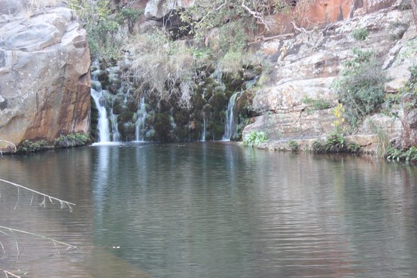waterfall and waterpond at the end of the leopard trail inside the blyde canyon forever resort