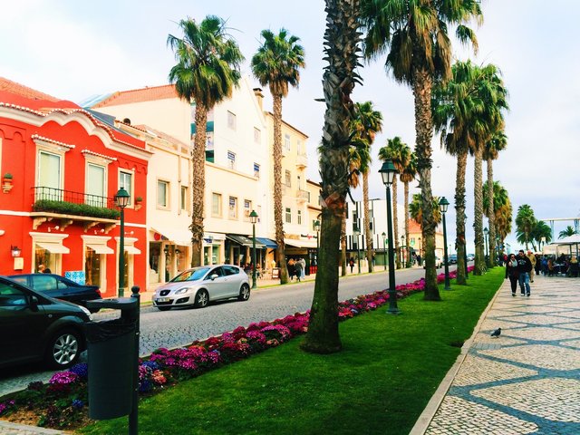 architecture, building, street, town, daytime, outdoors, city, nobody, travel, tourism, urban, house, vacation, road, walkway, typical, hotel, sidewalk, tourist, people